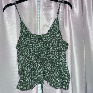 Green and white floral cropped tank